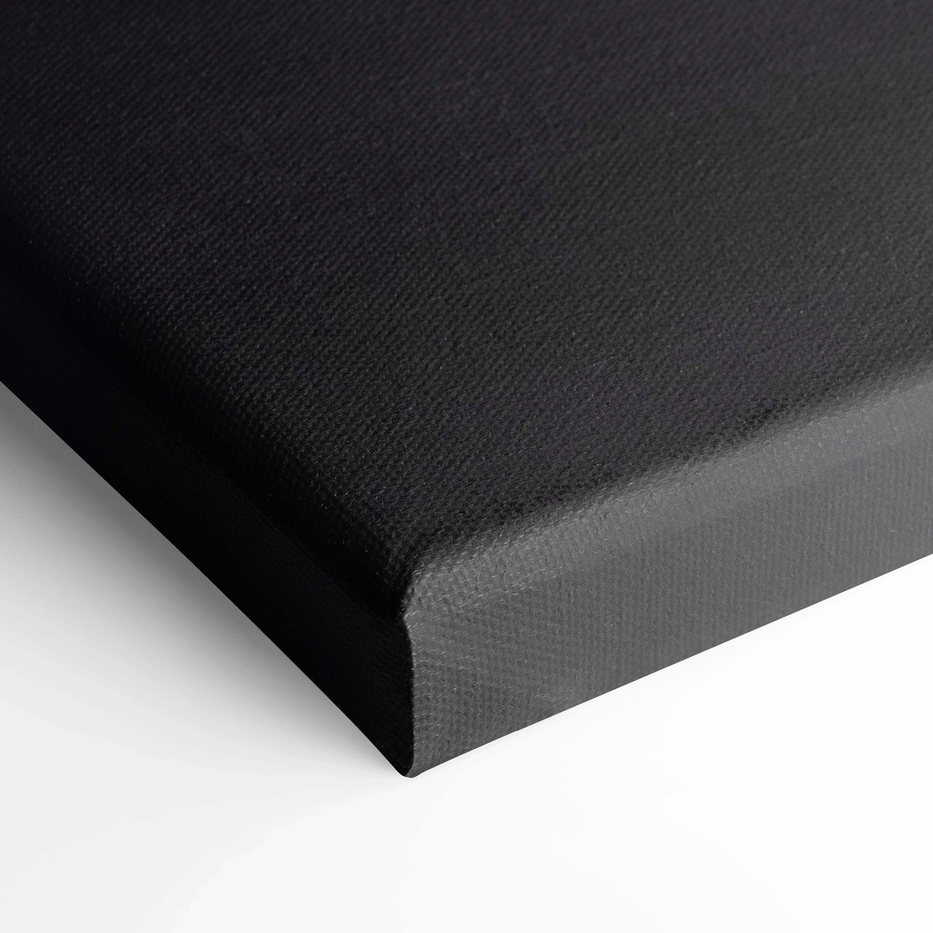 Black canvas corner close-up showcasing textured fabric for high-quality wall art canvas print.