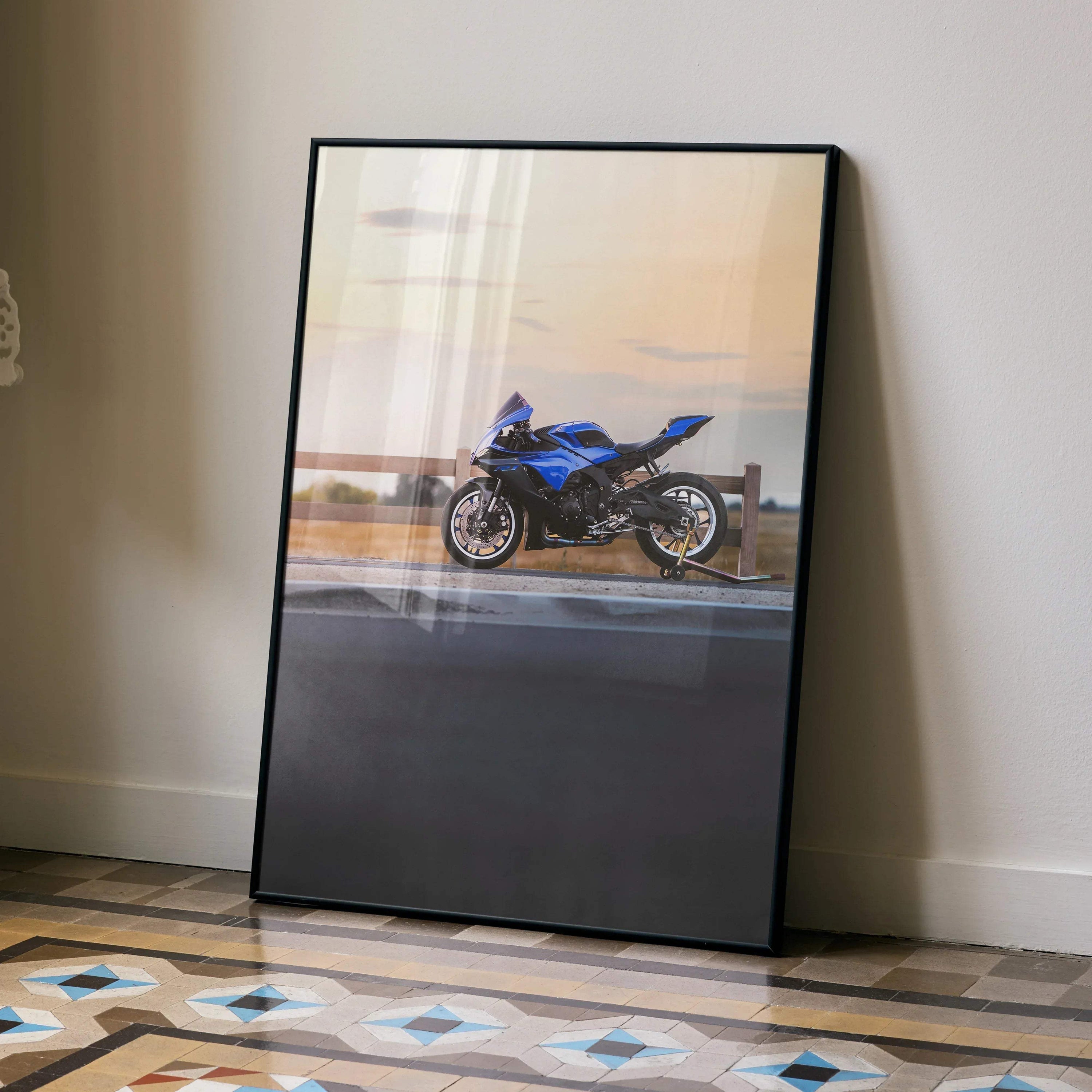 Blue Yamaha YZF-R1 motorcycle poster leaning against a white wall on patterned tile floor wall art.