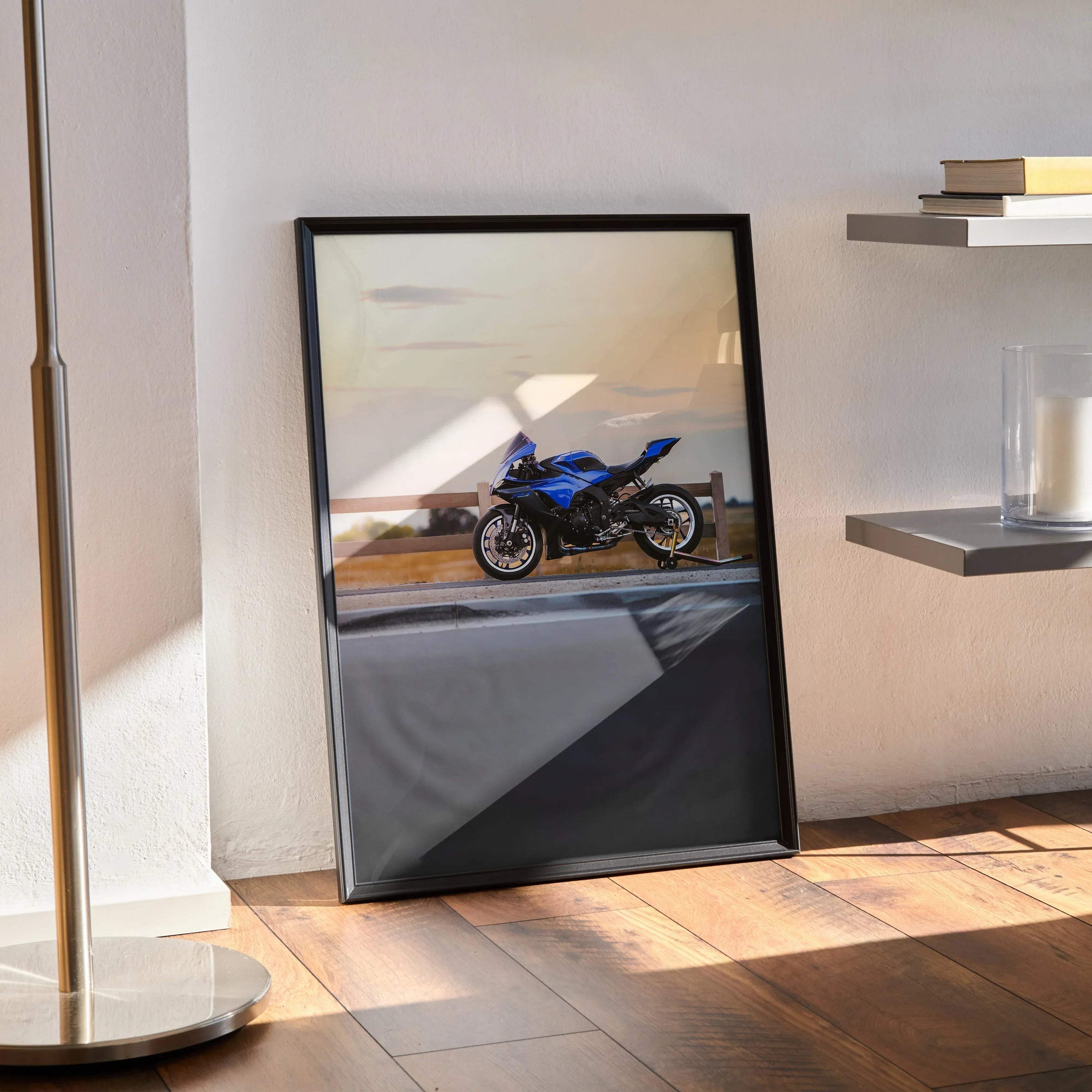 YZF-R1 motorcycle poster in black frame leaning against wall, blue sports bike wall art.