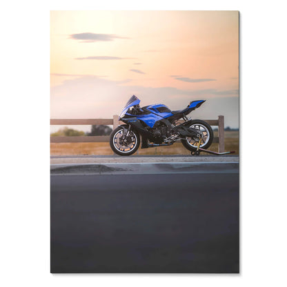 Blue Yamaha YZF-R1 motorcycle parked on roadside at sunset poster wall art.