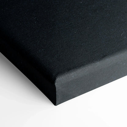 Close-up of black canvas corner with textured surface for wall art print.