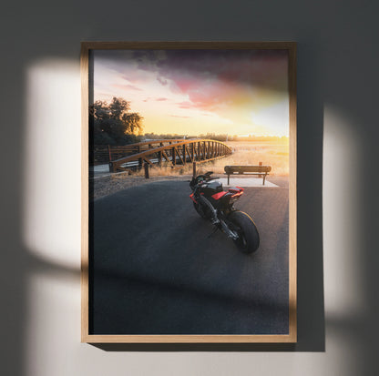 Aprilia RSV4 1100 Factory motorcycle poster at sunset by wooden fence, wall art decor.
