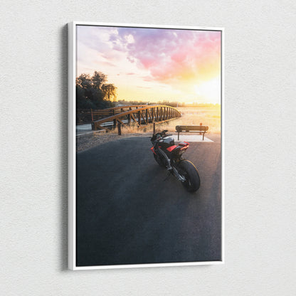 Aprilia RSV4 1100 Factory motorcycle on sunset beach canvas wall art in vertical format.