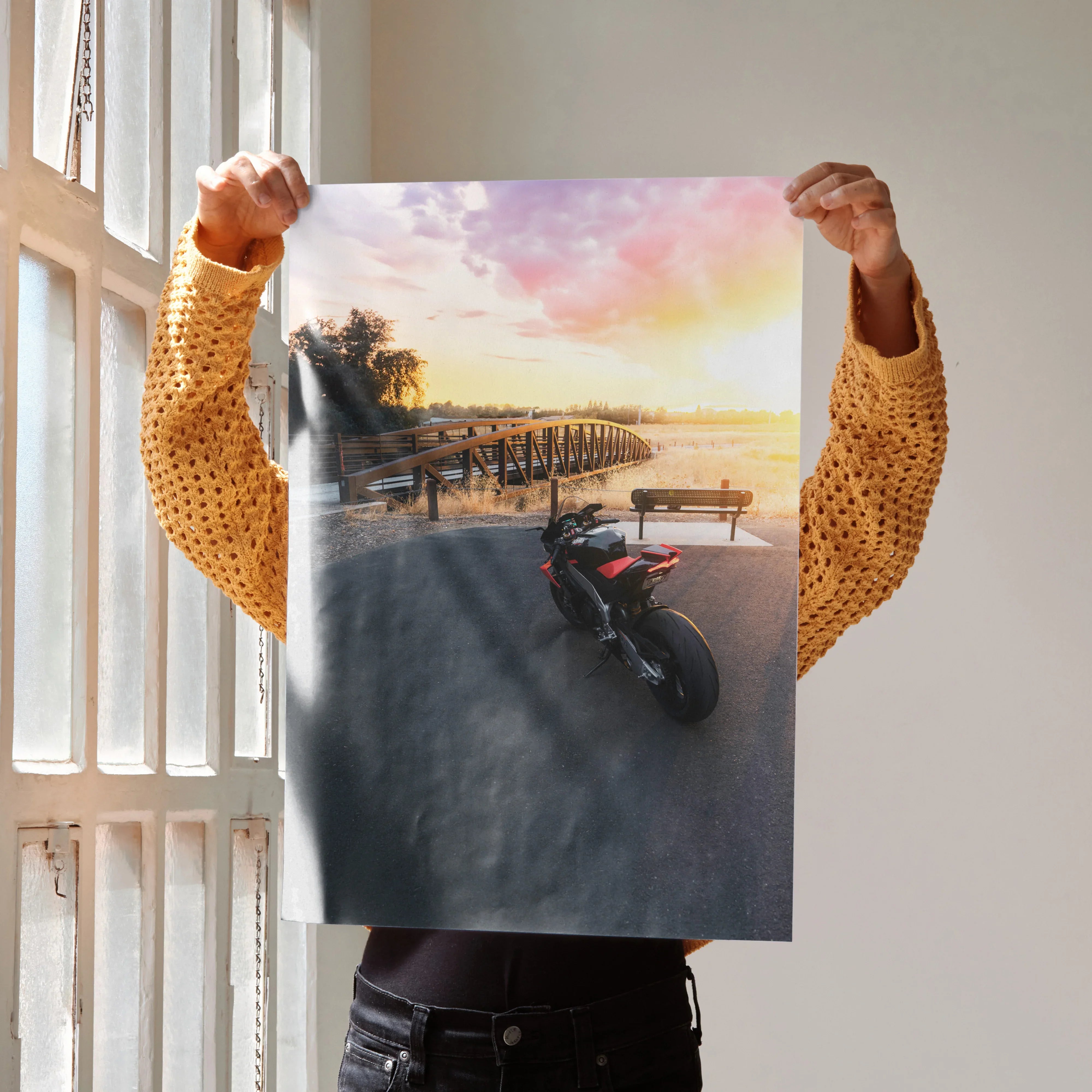 Poster of Aprilia RSV4 1100 Factory motorcycle at sunset by a pier, vibrant wall art.