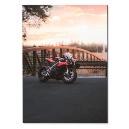 Aprilia RSV4 1100 Factory motorcycle parked by wooden fence at sunset poster wall art.