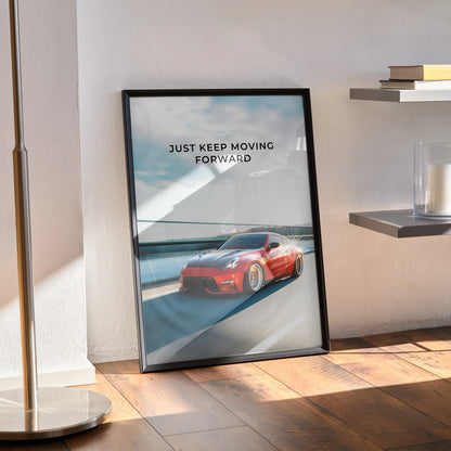 Motivational poster with red Nissan 370z car and "Just Keep Moving Forward" text wall art.