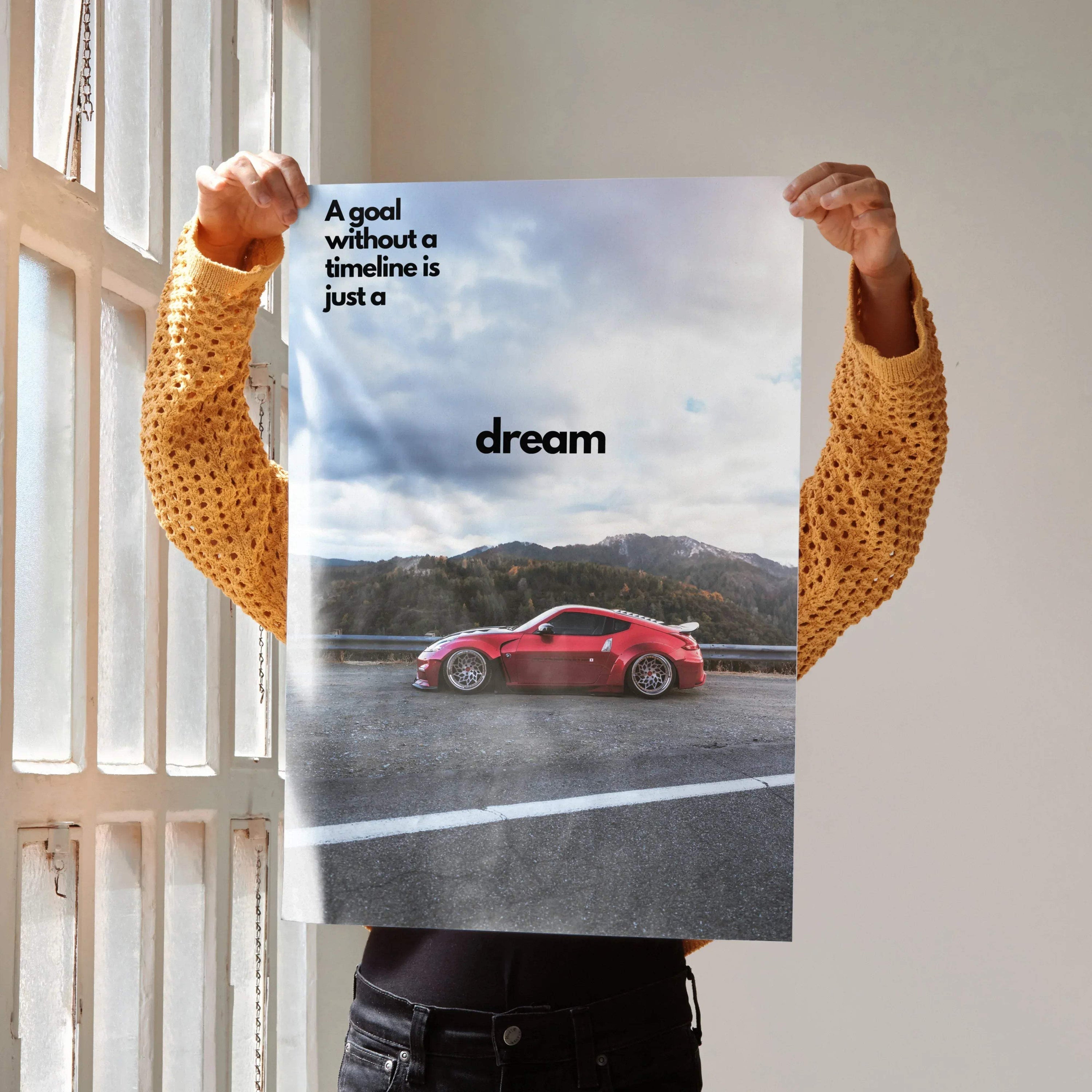 Motivational poster featuring red Nissan 370z on road with inspiring text dream wall art.