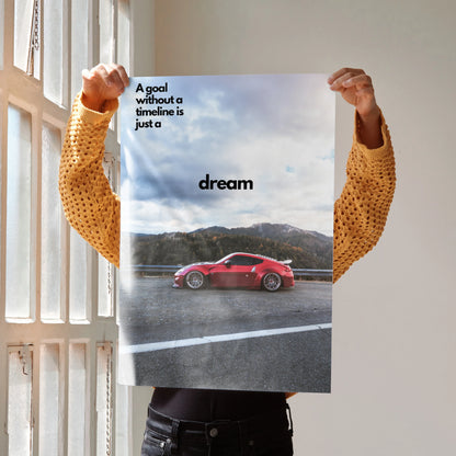 Motivational poster featuring red Nissan 370z on road with inspiring text dream wall art.