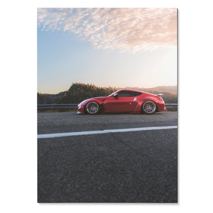 Red Nissan 370Z sports car parked on roadside at sunset poster wall art.