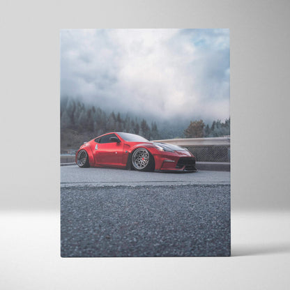 Red Nissan 370z sports car on road with foggy mountain background vertical canvas wall art.