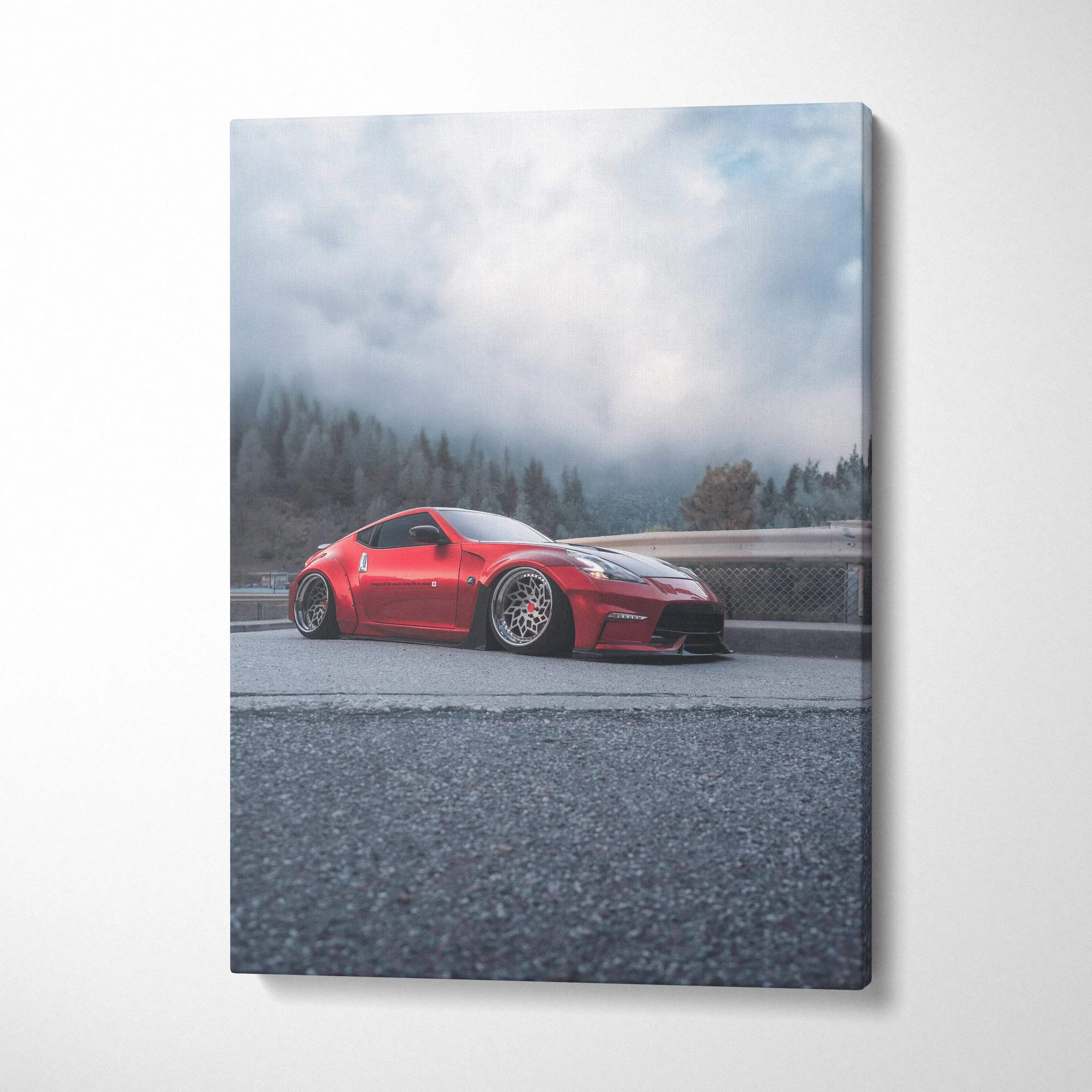 Red Nissan 370z on wet road with foggy forest background vertical canvas wall art.
