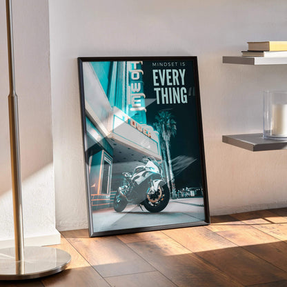 BMW S1000RR poster with motivational text "Mindset is everything" wall art in modern room setting.