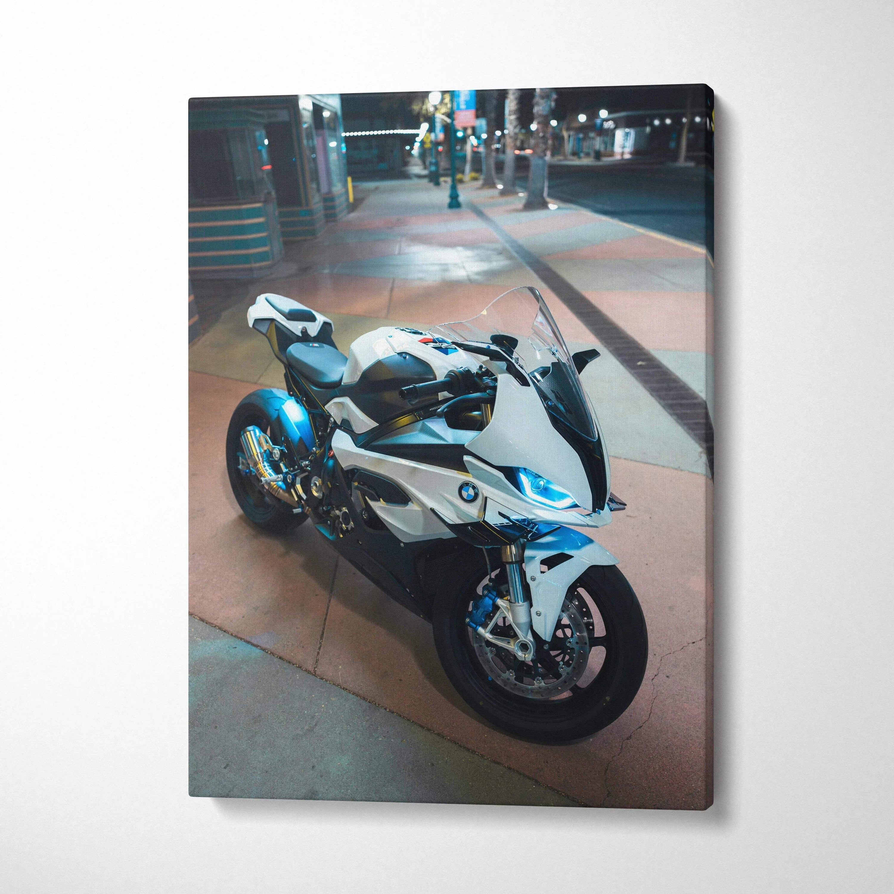 BMW S1000RR motorcycle at night on vertical canvas wall art with glossy finish.