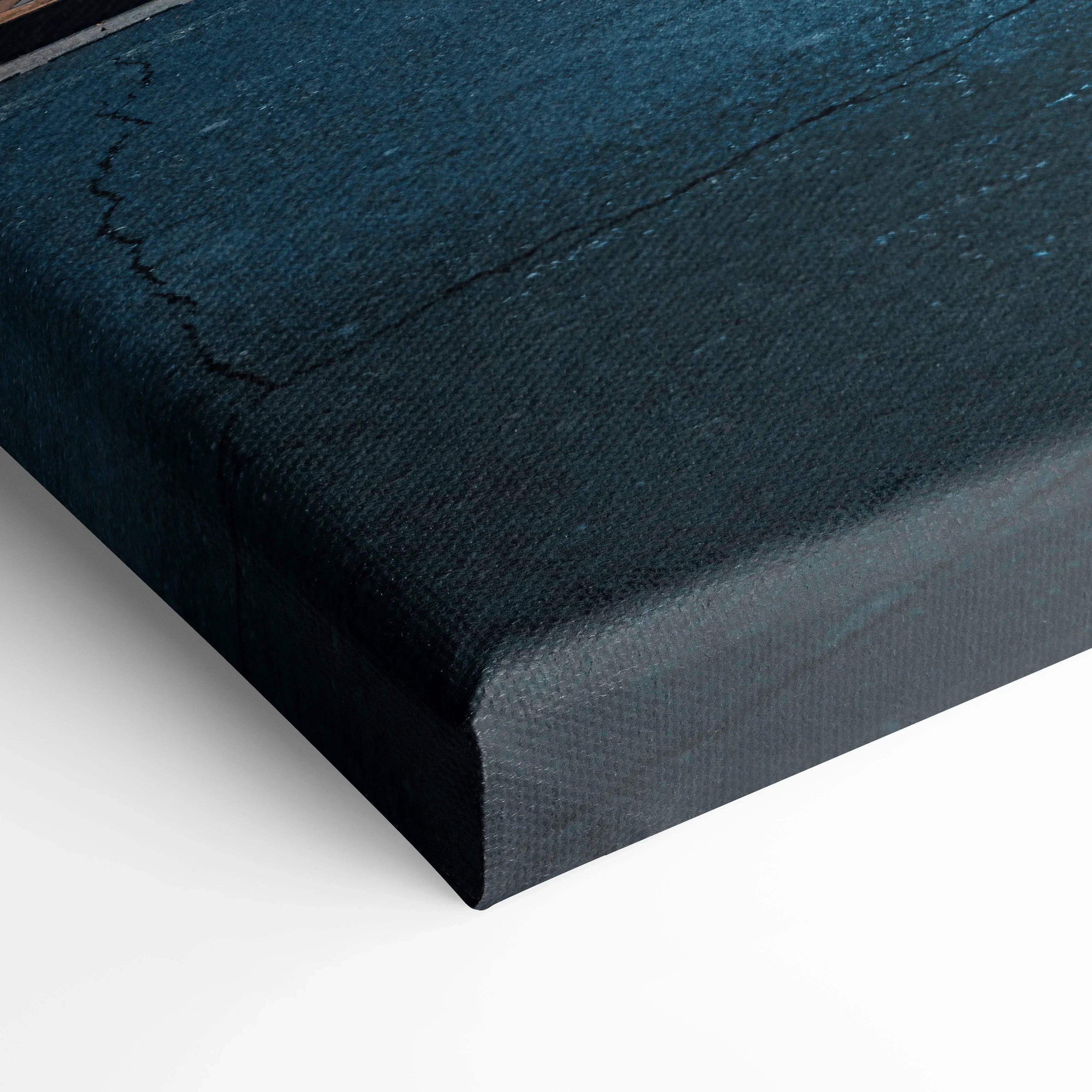 Close-up of dark textured canvas wall art with a subtle woven pattern and clean edges.