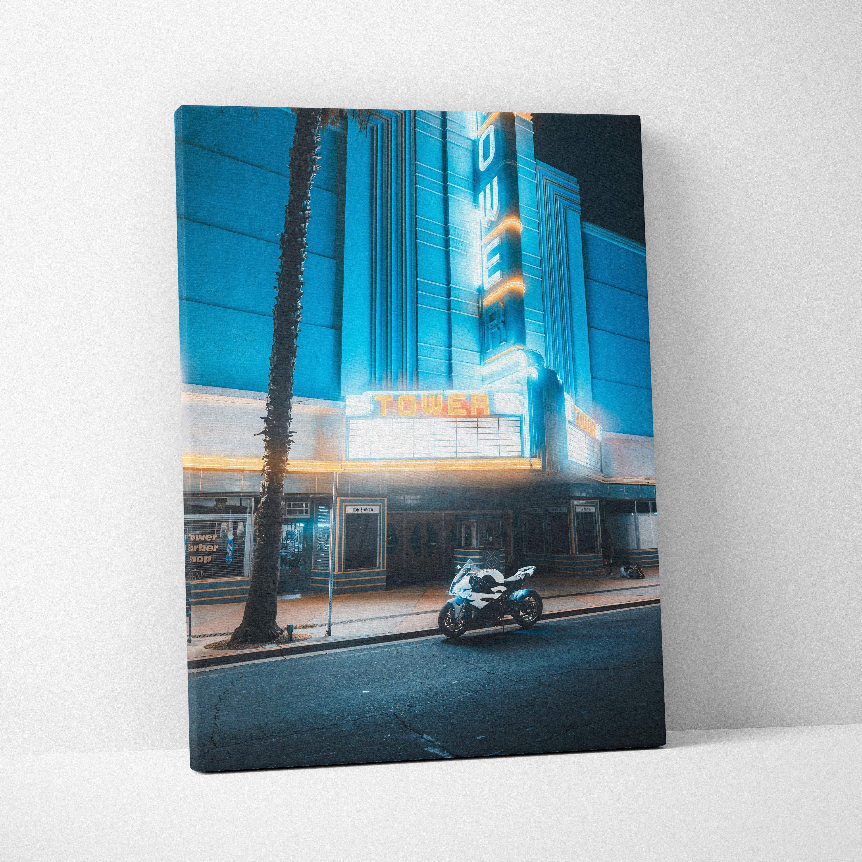 BMW S1000RR motorcycle parked at night under neon lights on vertical canvas wall art.