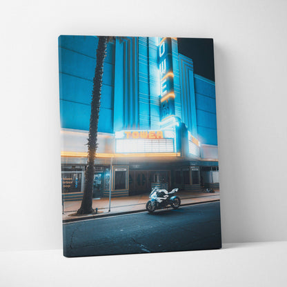 BMW S1000RR motorcycle parked at night under neon lights on vertical canvas wall art.