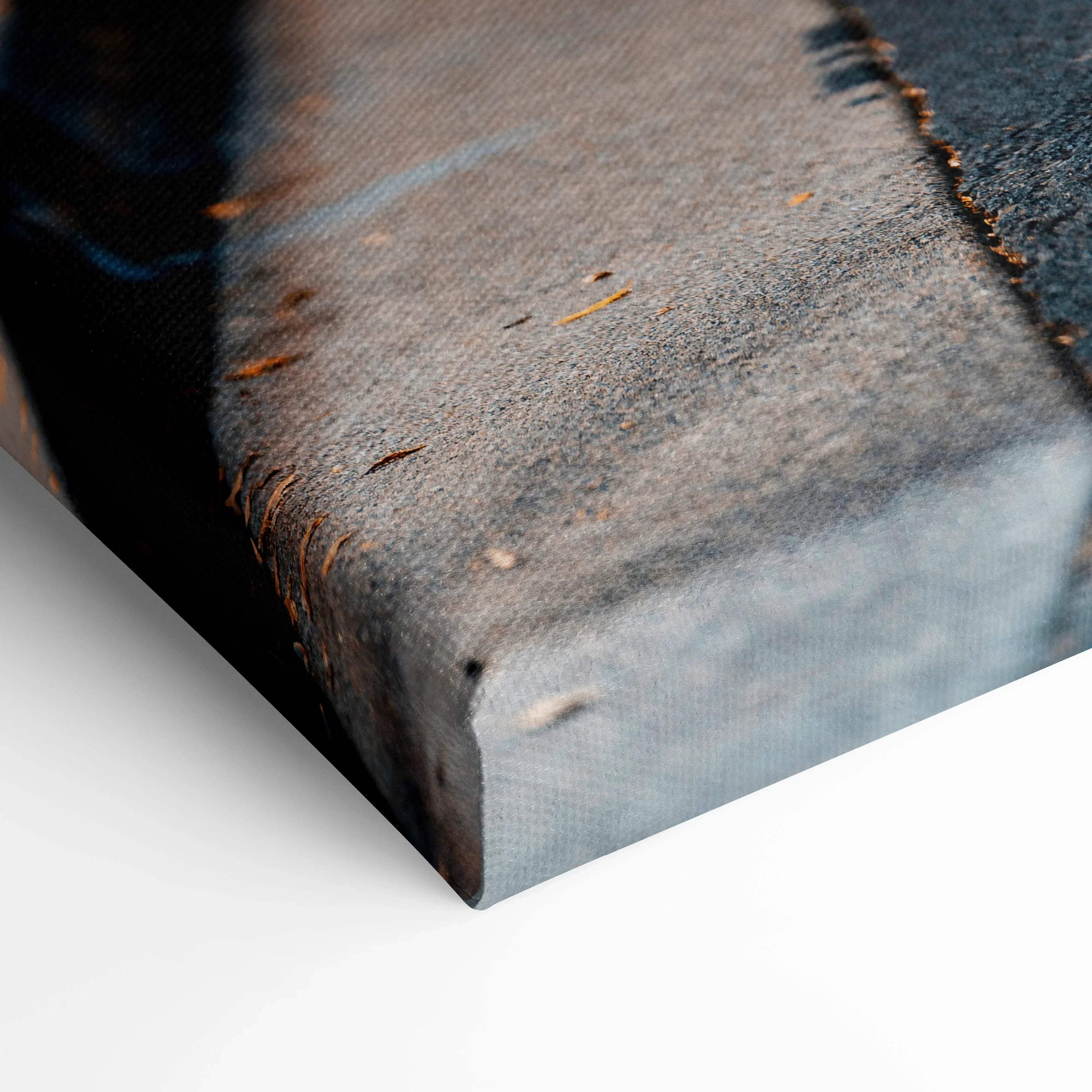 Close-up of textured gray canvas corner with high-resolution print detail for wall art canvas quality.