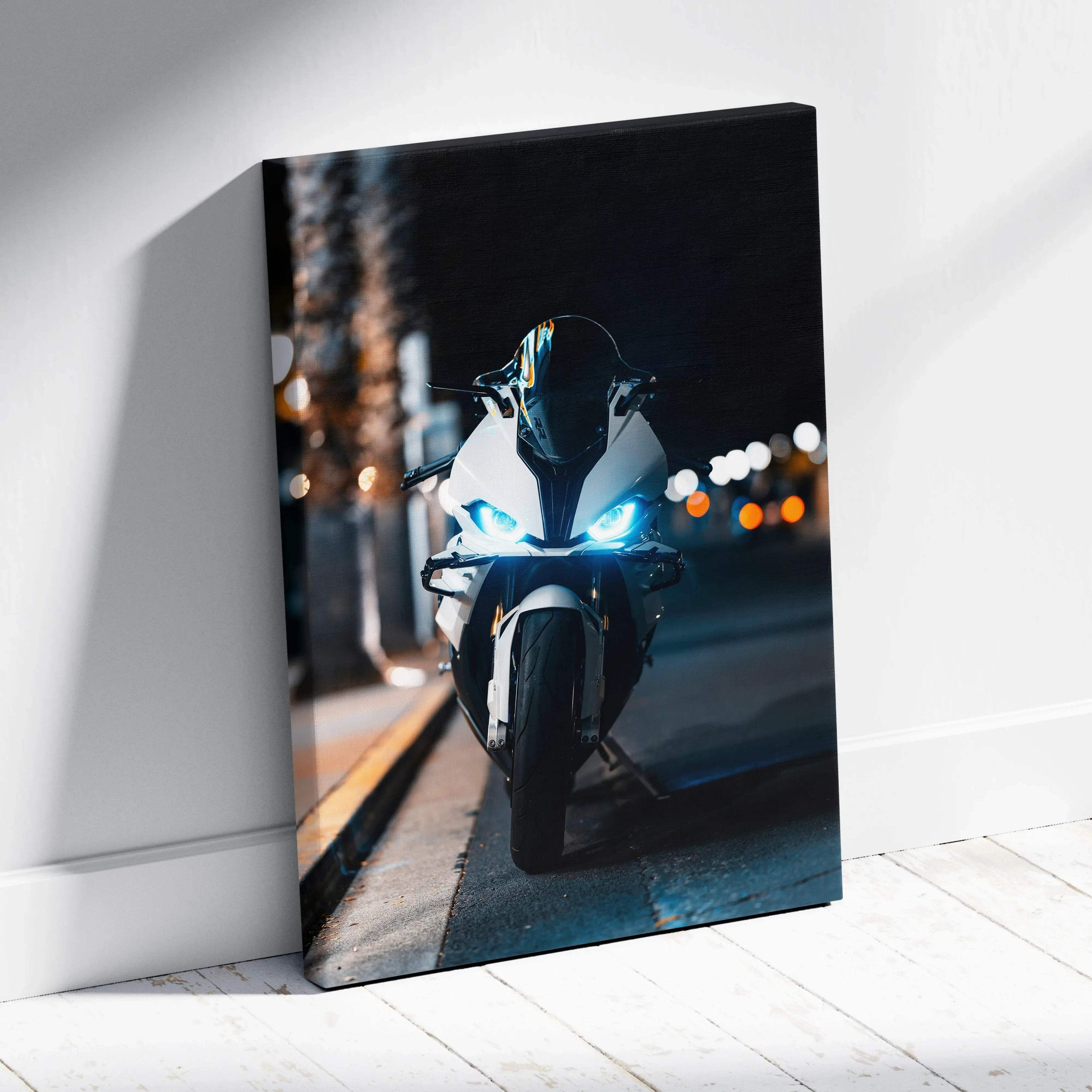 BMW S1000RR motorcycle night scene canvas art with glowing headlights and blurred city lights wall art.