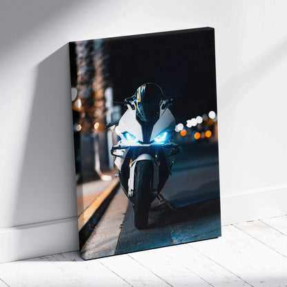 BMW S1000RR motorcycle night scene canvas art with glowing headlights and blurred city lights wall art.