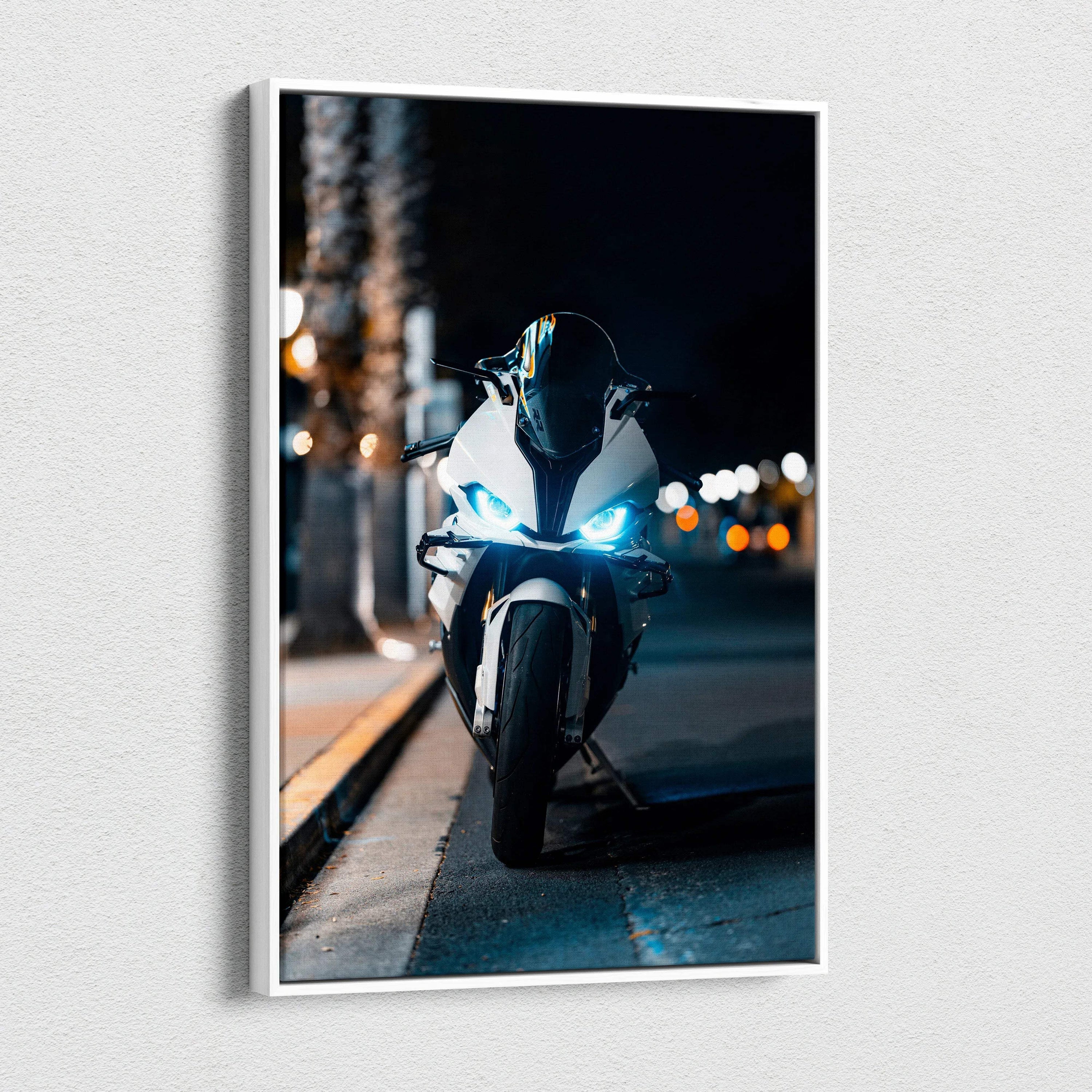BMW S1000RR motorcycle with blue headlights at night printed on vertical canvas wall art.