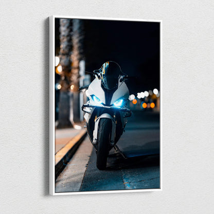 BMW S1000RR motorcycle with blue headlights at night printed on vertical canvas wall art.