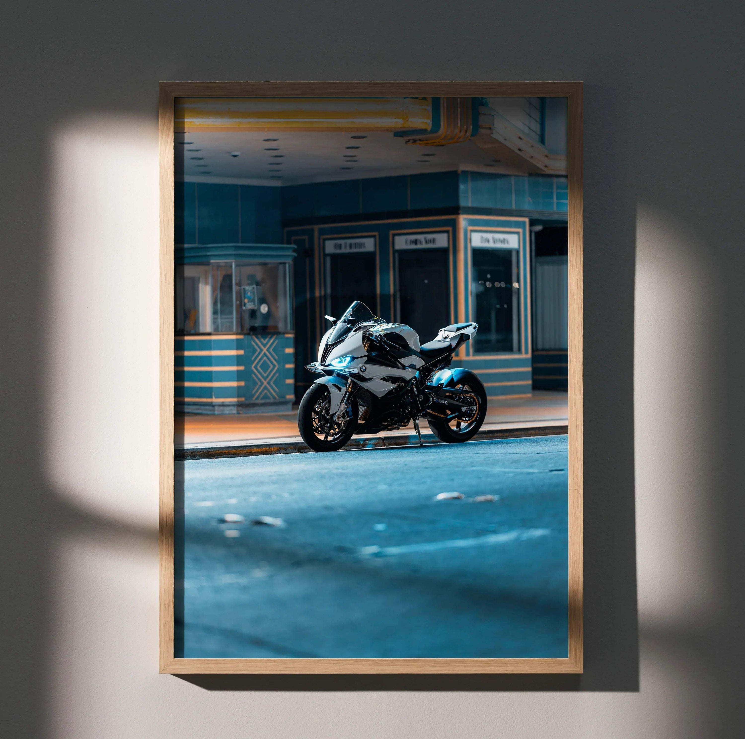 BMW S1000RR motorcycle parked outside retro diner poster wall art in moody lighting.
