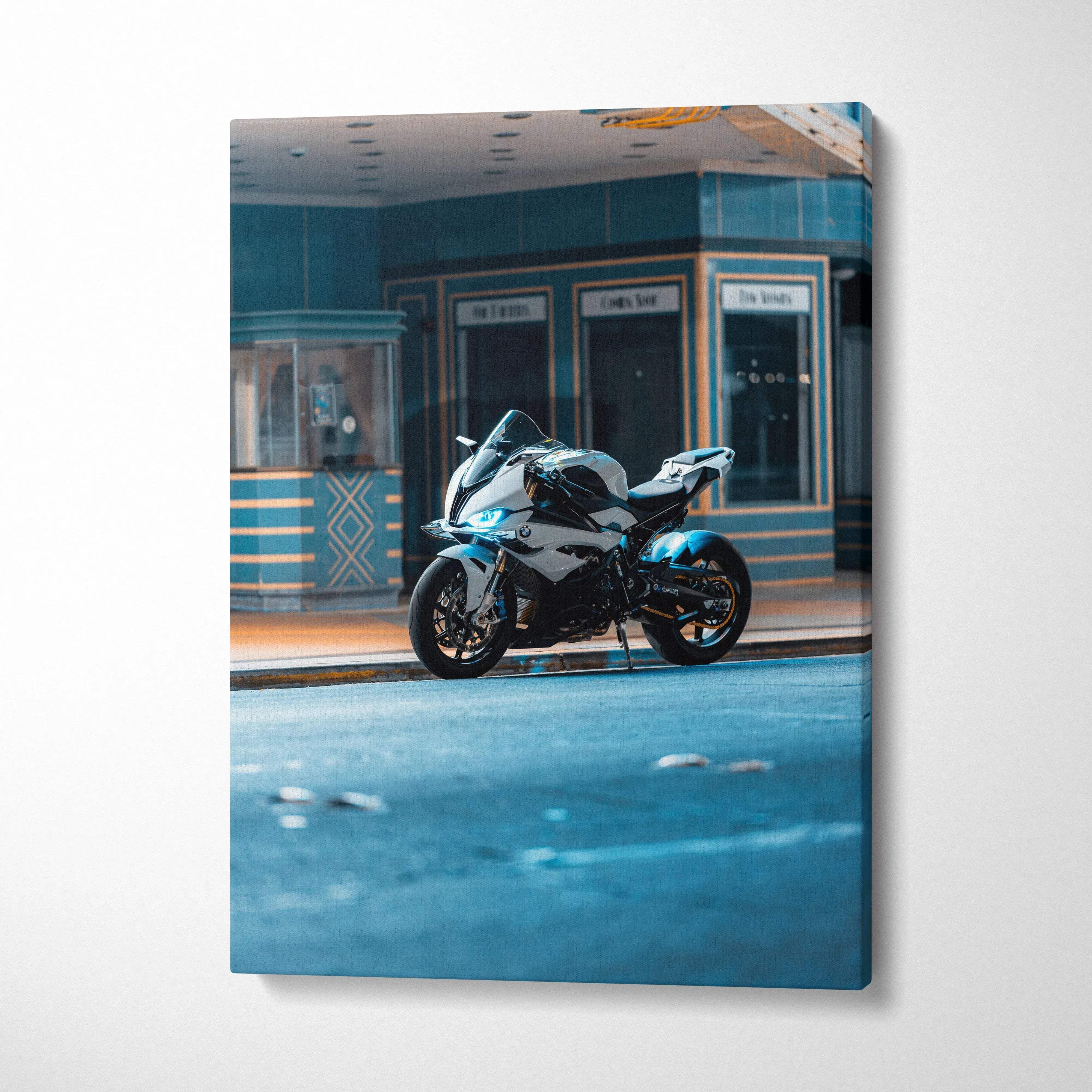 Vertical canvas art featuring a BMW S1000RR motorcycle in front of vintage storefronts, detailed wall art.