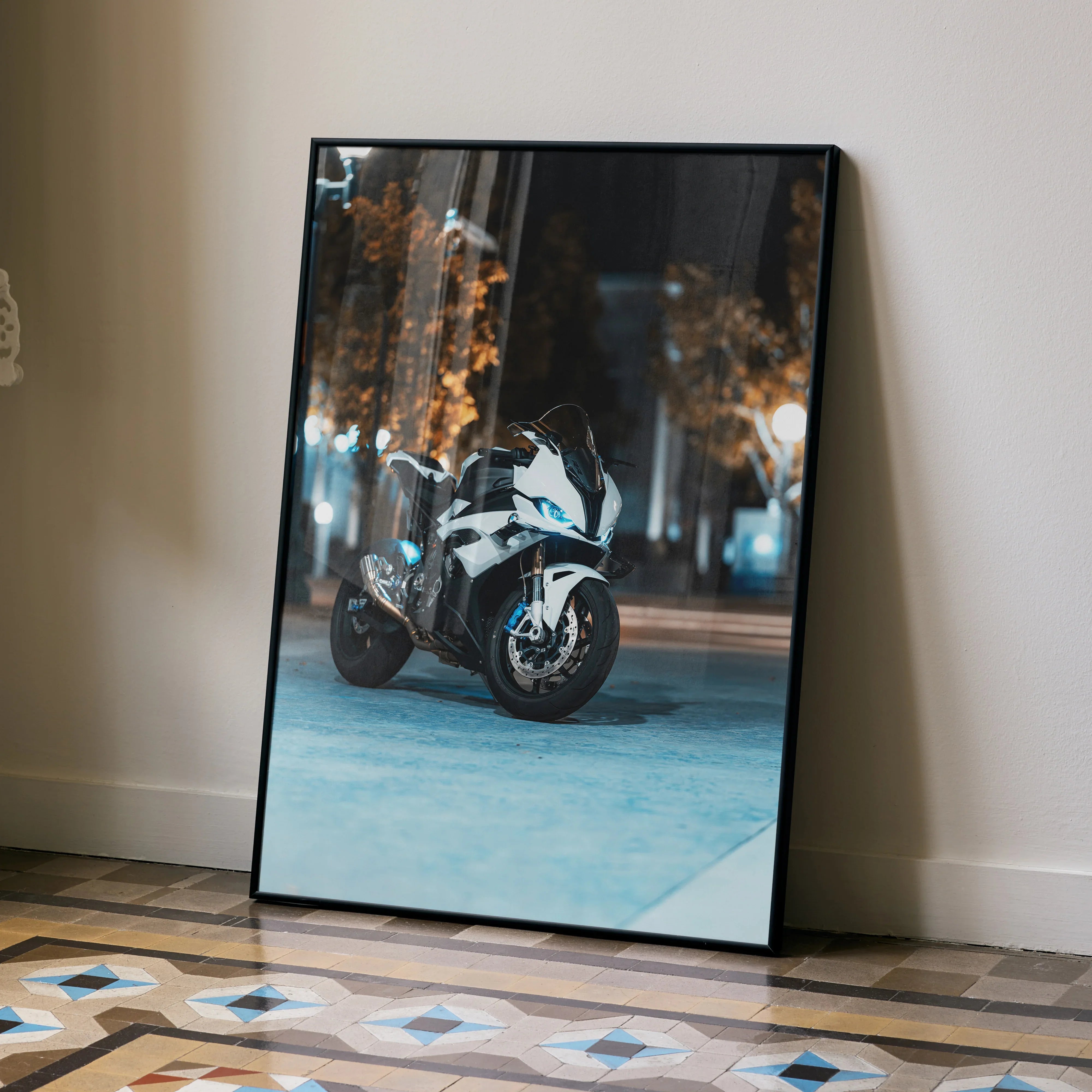 Framed poster wall art featuring BMW S1000RR motorcycle parked in urban nighttime setting.