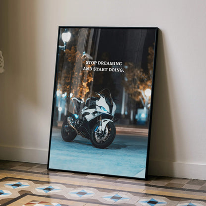 BMW S1000RR motorcycle poster with motivational text "Stop dreaming and start doing" on wall art.
