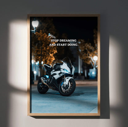 Motivational poster wall art featuring BMW S1000RR motorcycle with inspiring text "Stop Dreaming And Start Doing" at night.