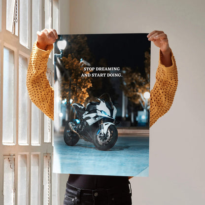 Motivational poster wall art featuring BMW S1000RR motorcycle with inspiring text "Stop dreaming and start doing".