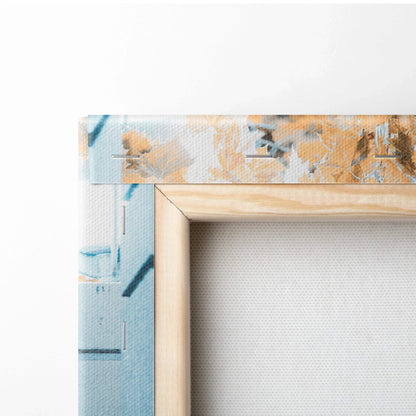 Close-up of beige wooden frame and detailed canvas texture with blue and orange abstract art, vertical canvas wall art.