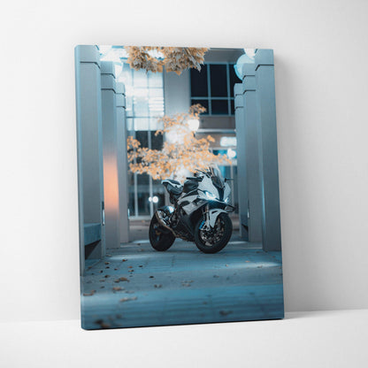 BMW S1000RR motorcycle canvas art with urban architectural backdrop in cool blue tones wall art.