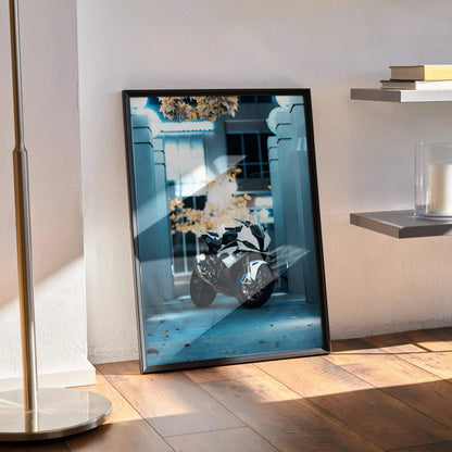 BMW S1000RR motorcycle poster with sleek racing design framed as modern wall art in minimalist room.