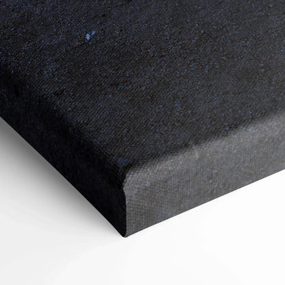 Close-up of textured black canvas corner with museum-quality stretch and clean edges, vertical wall art.