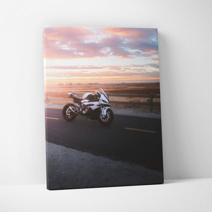 BMW S1000RR motorcycle against sunset sky on vertical canvas wall art print.