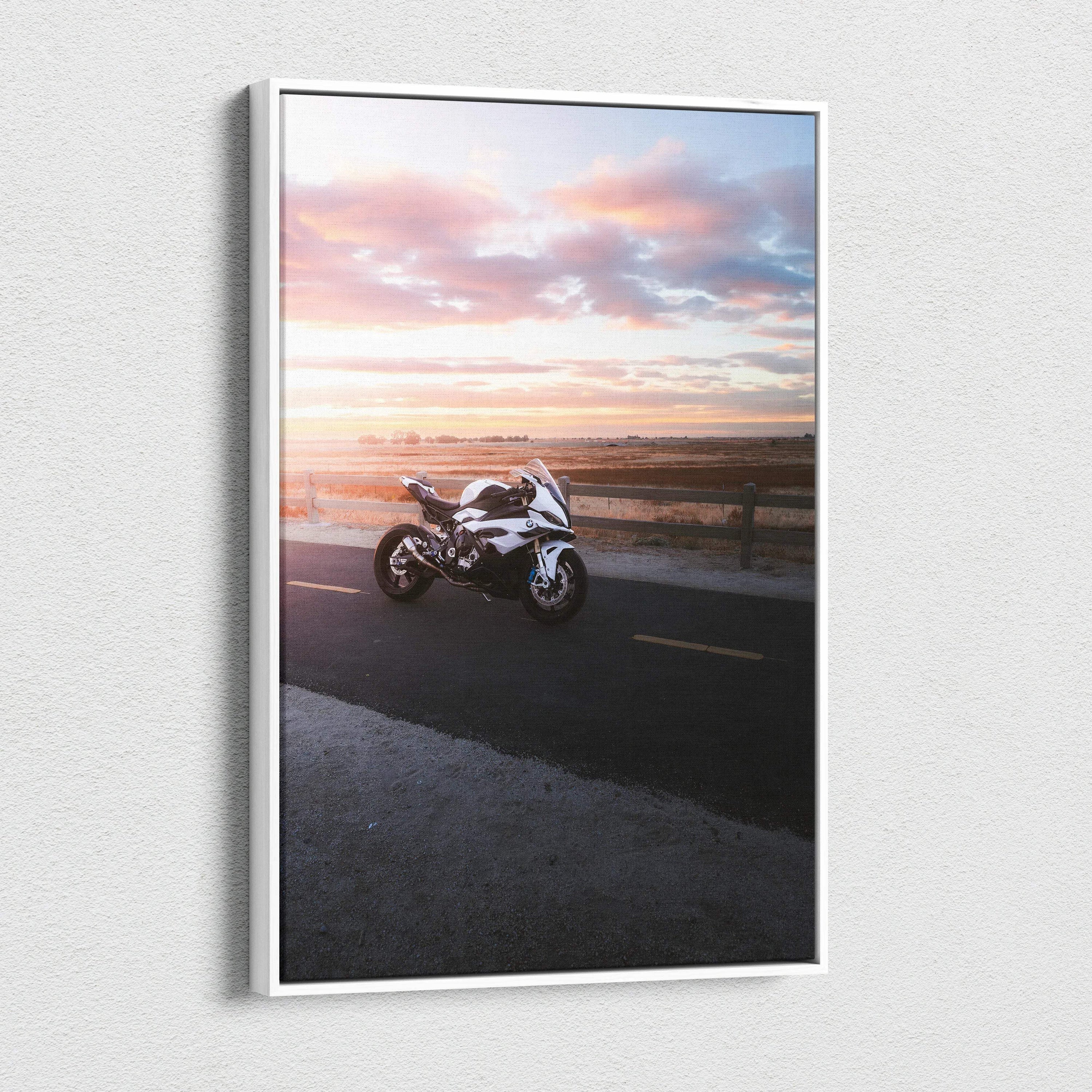 Vertical canvas wall art featuring BMW S1000RR motorcycle at sunset with vibrant sky colors.