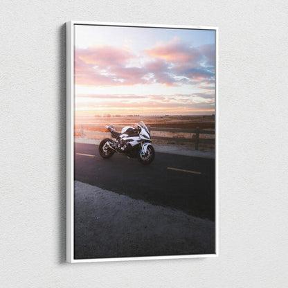 Vertical canvas wall art featuring BMW S1000RR motorcycle at sunset with vibrant sky colors.