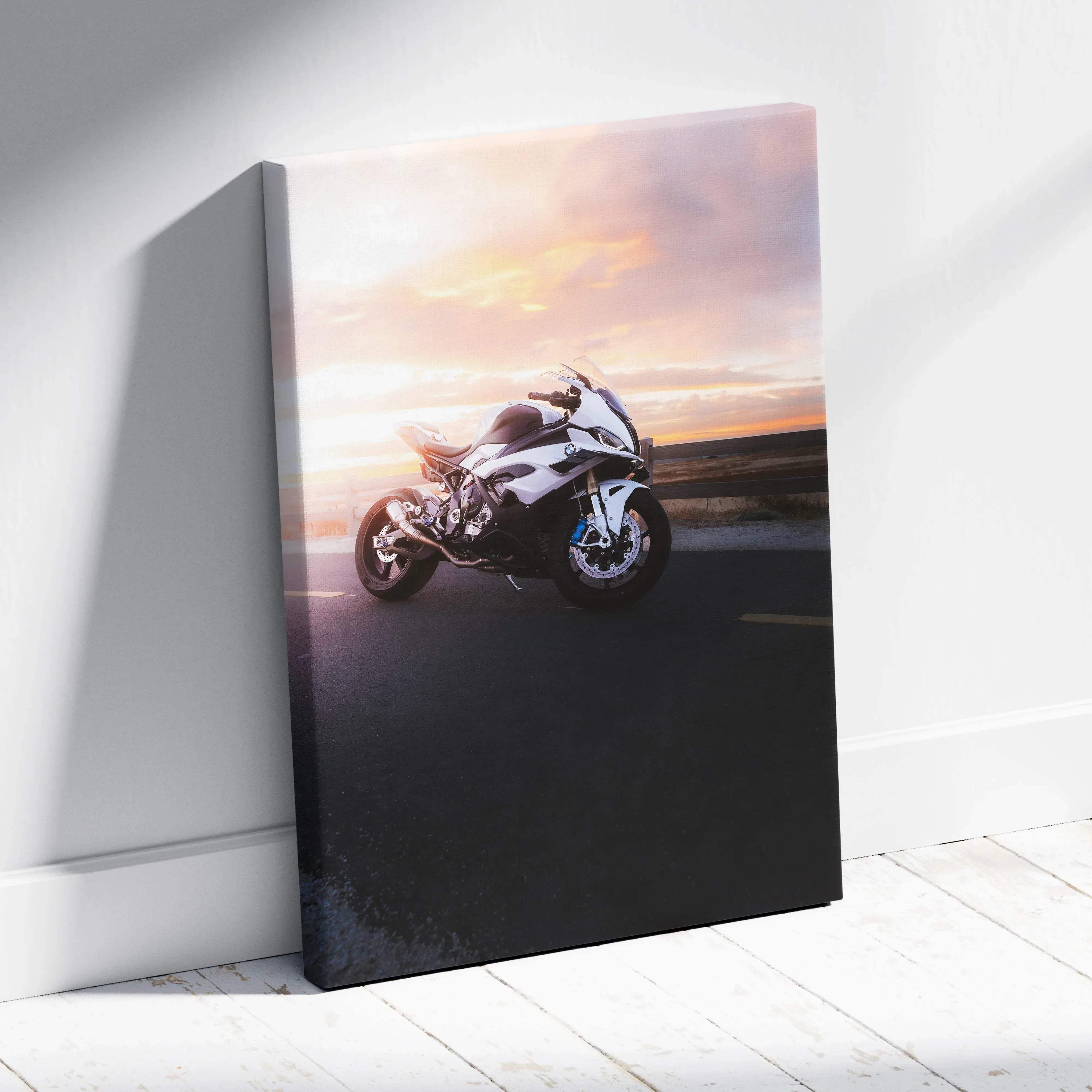 White bmw s1000rr sportbike canvas wall art featuring sleek motorcycle against a vibrant sunset sky