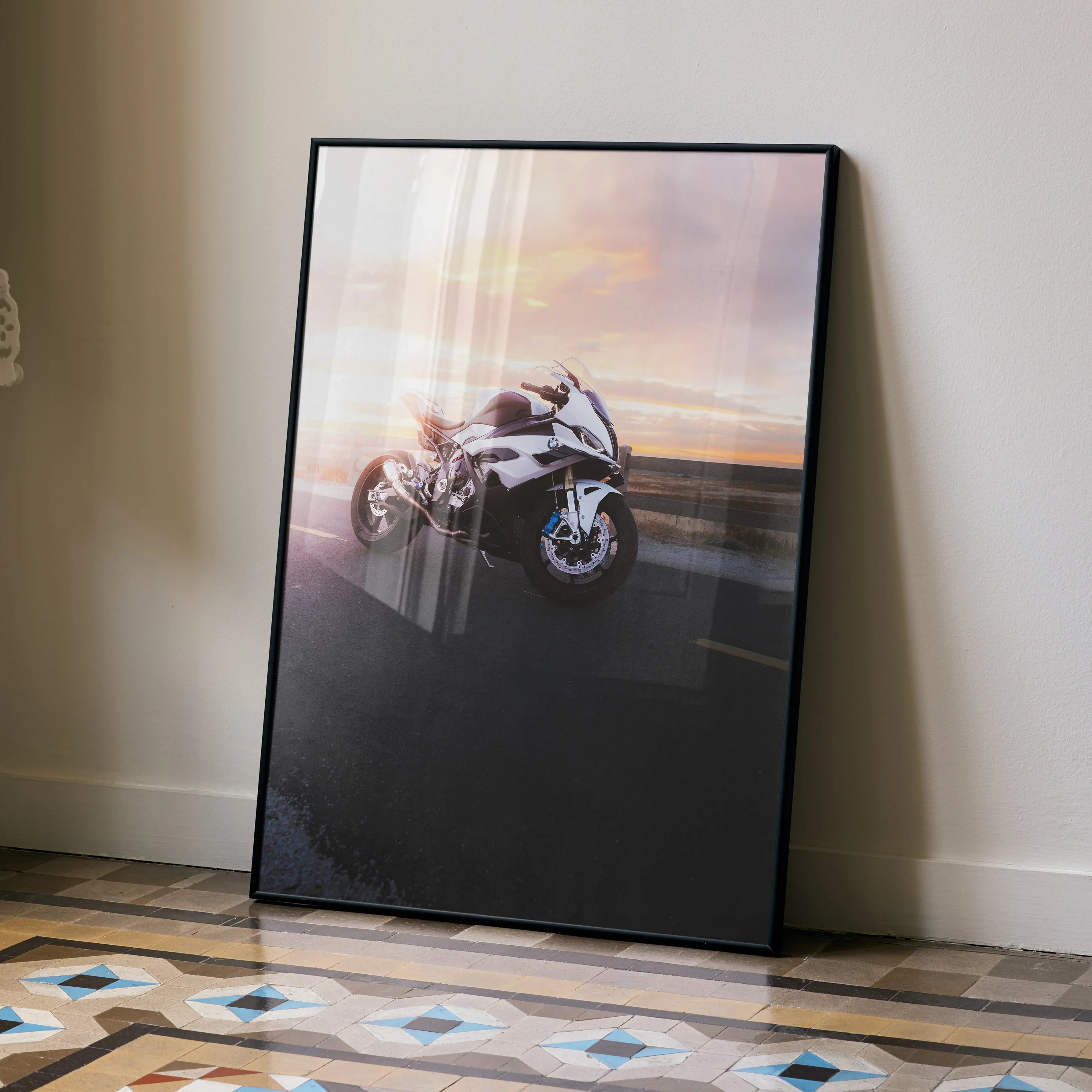 BMW S1000RR motorcycle poster with sunset background, sleek wall art decor in black frame.