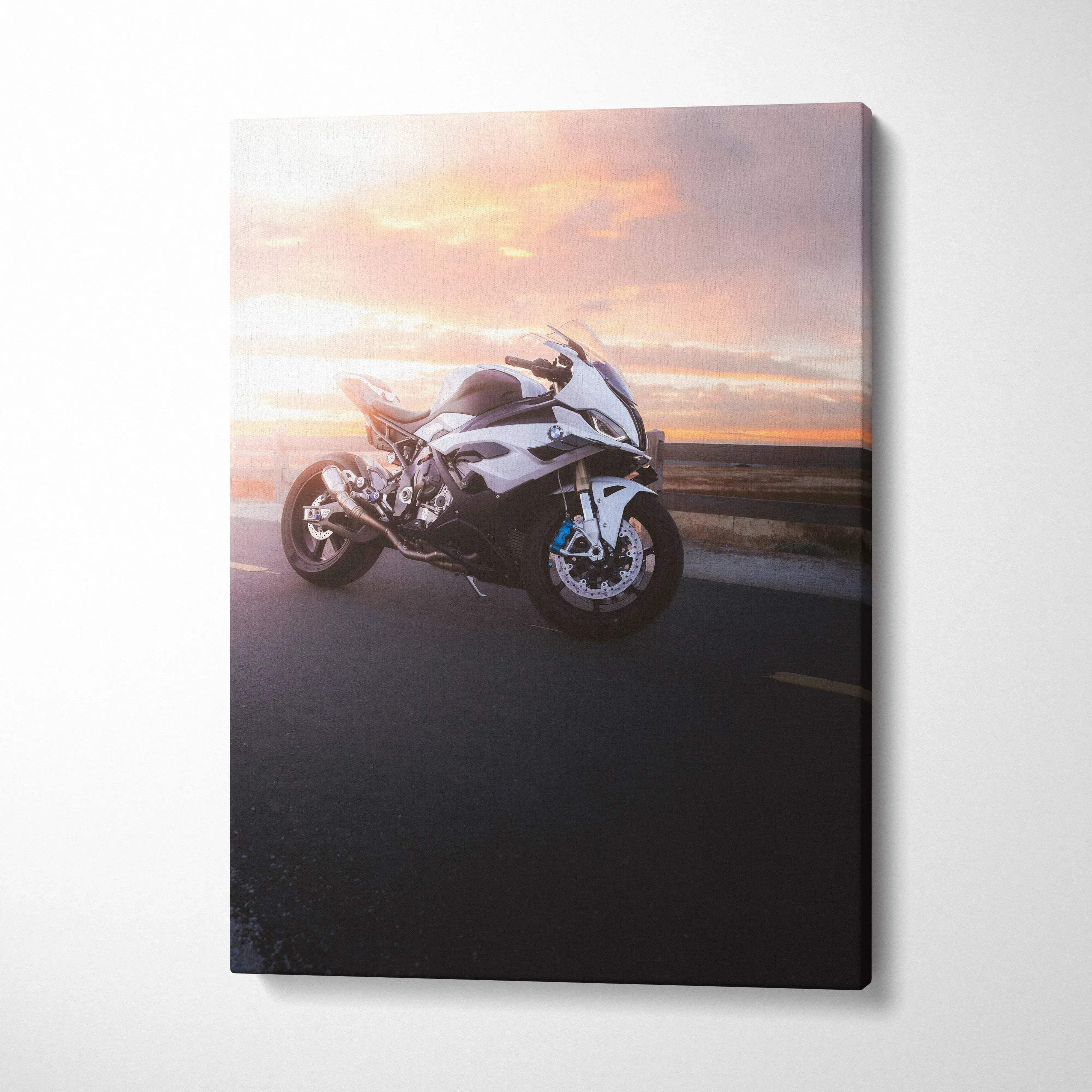 BMW S1000RR sportbike on road at sunset canvas wall art with vibrant sky colors.