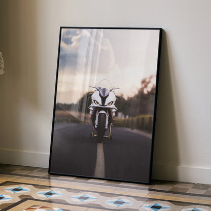 BMW S1000RR motorcycle poster wall art featuring a sunset road scene with sleek bike front view.