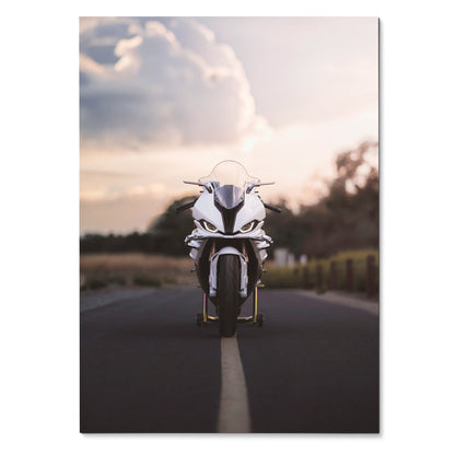 BMW S1000RR motorcycle poster with sunset sky background, sleek front view wall art.