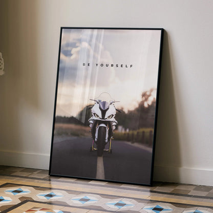 Motivational poster wall art featuring BMW S1000RR motorcycle on open road with "Be Yourself" text.