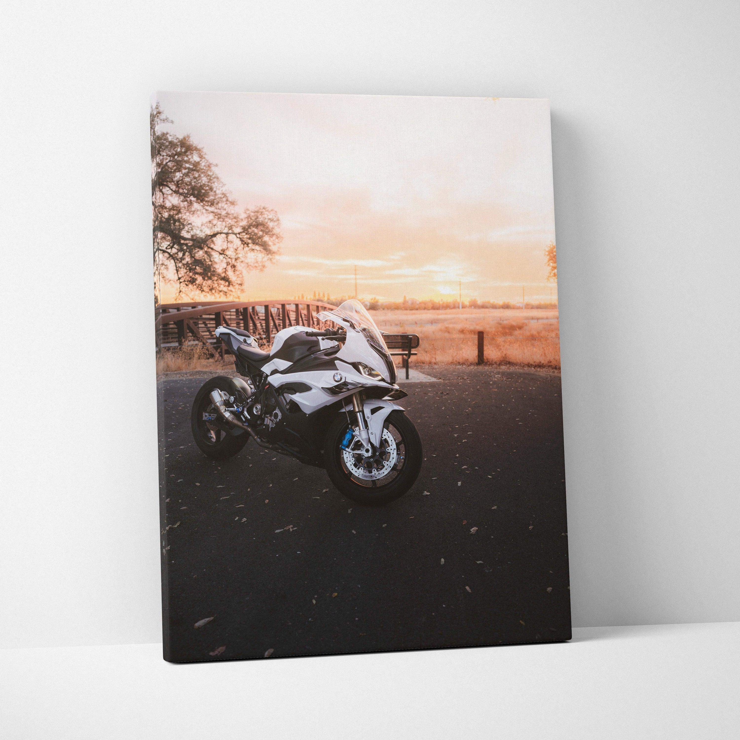 BMW S1000RR motorcycle against sunset backdrop on vertical canvas wall art.