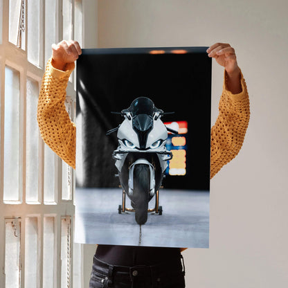 BMW S1000RR motorcycle front view poster wall art with dark background and colorful light accents.