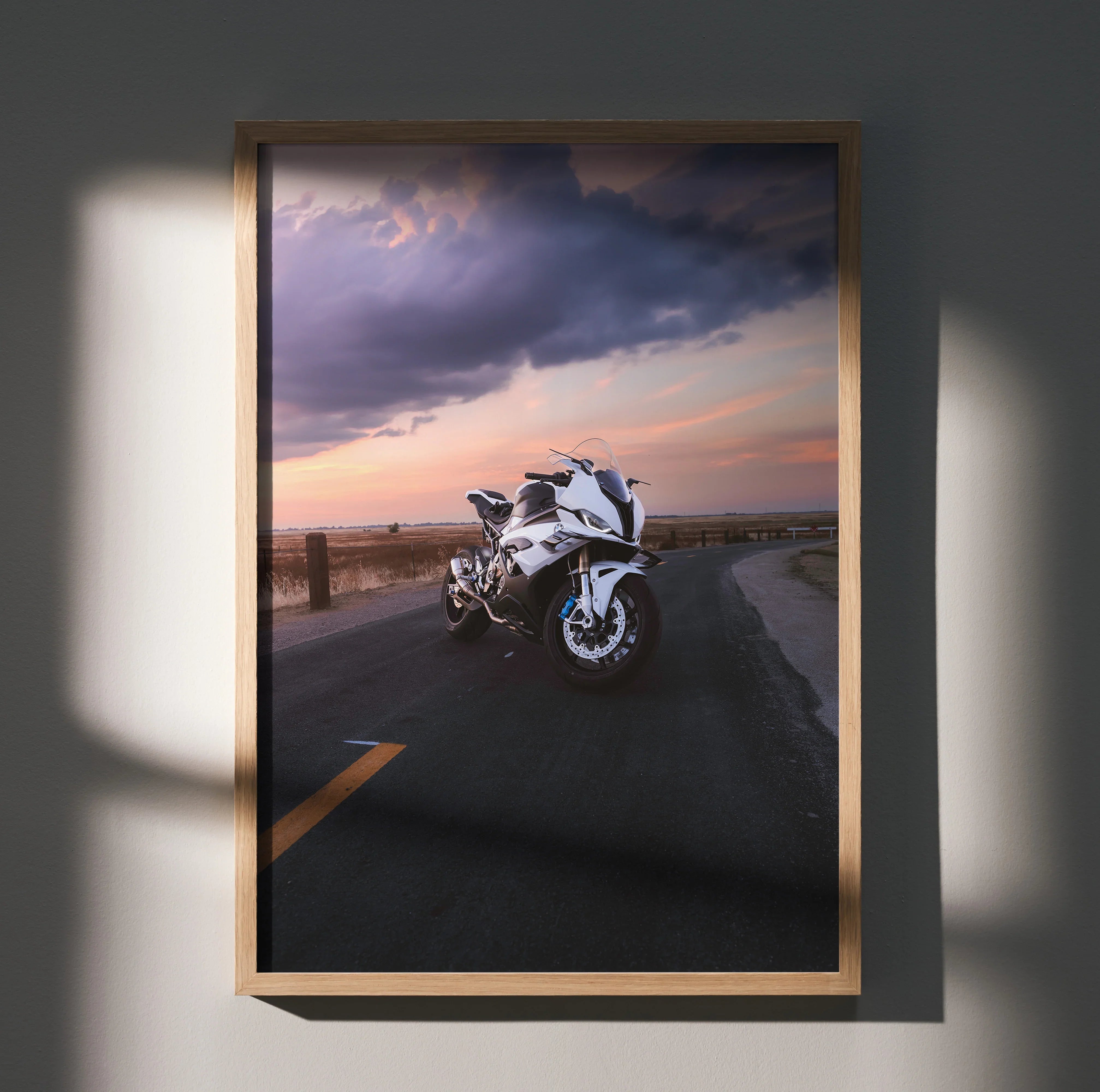BMW S1000RR motorcycle poster with dramatic sunset sky, road background, framed wall art.