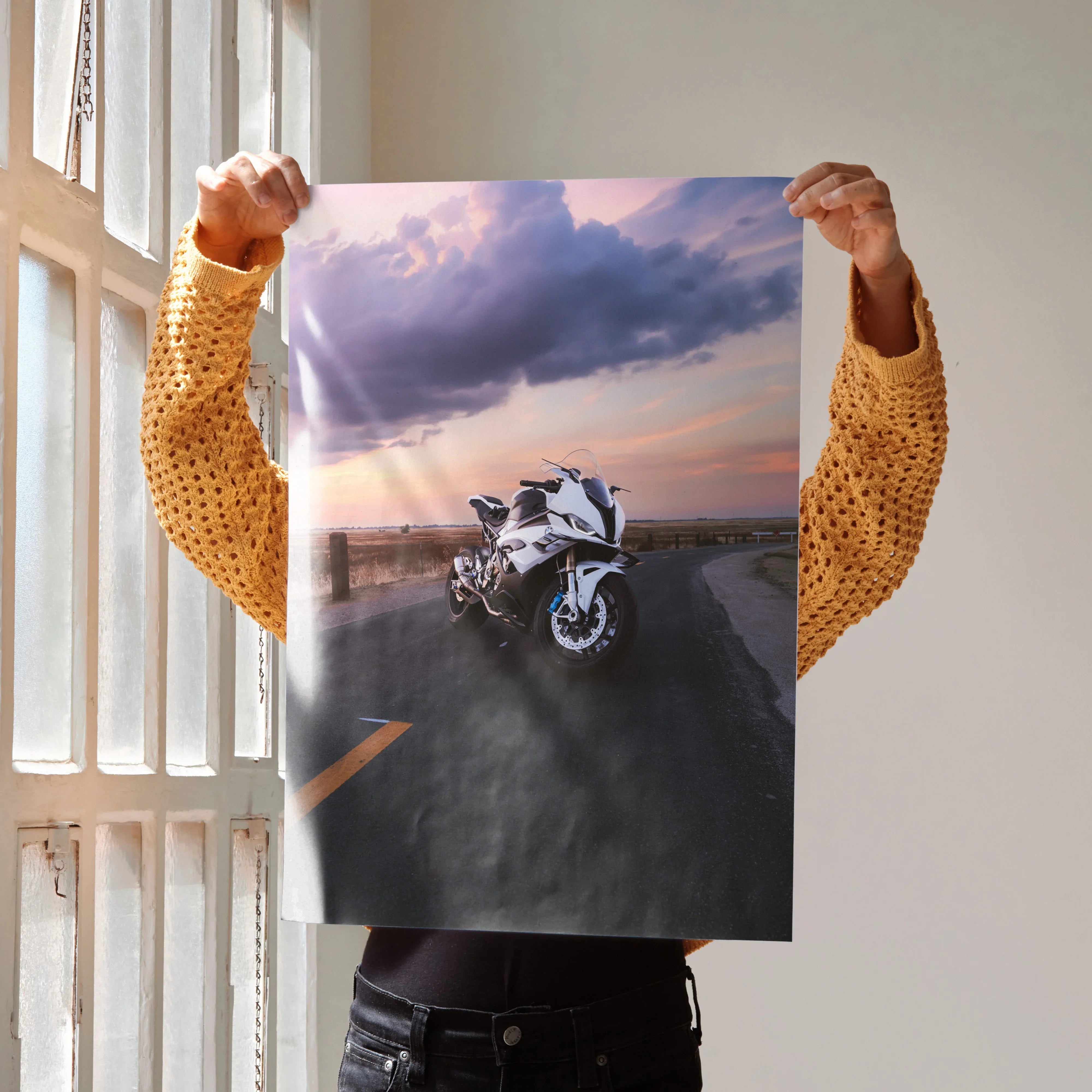 BMW S1000RR motorcycle wall art poster with sunset sky and road background.