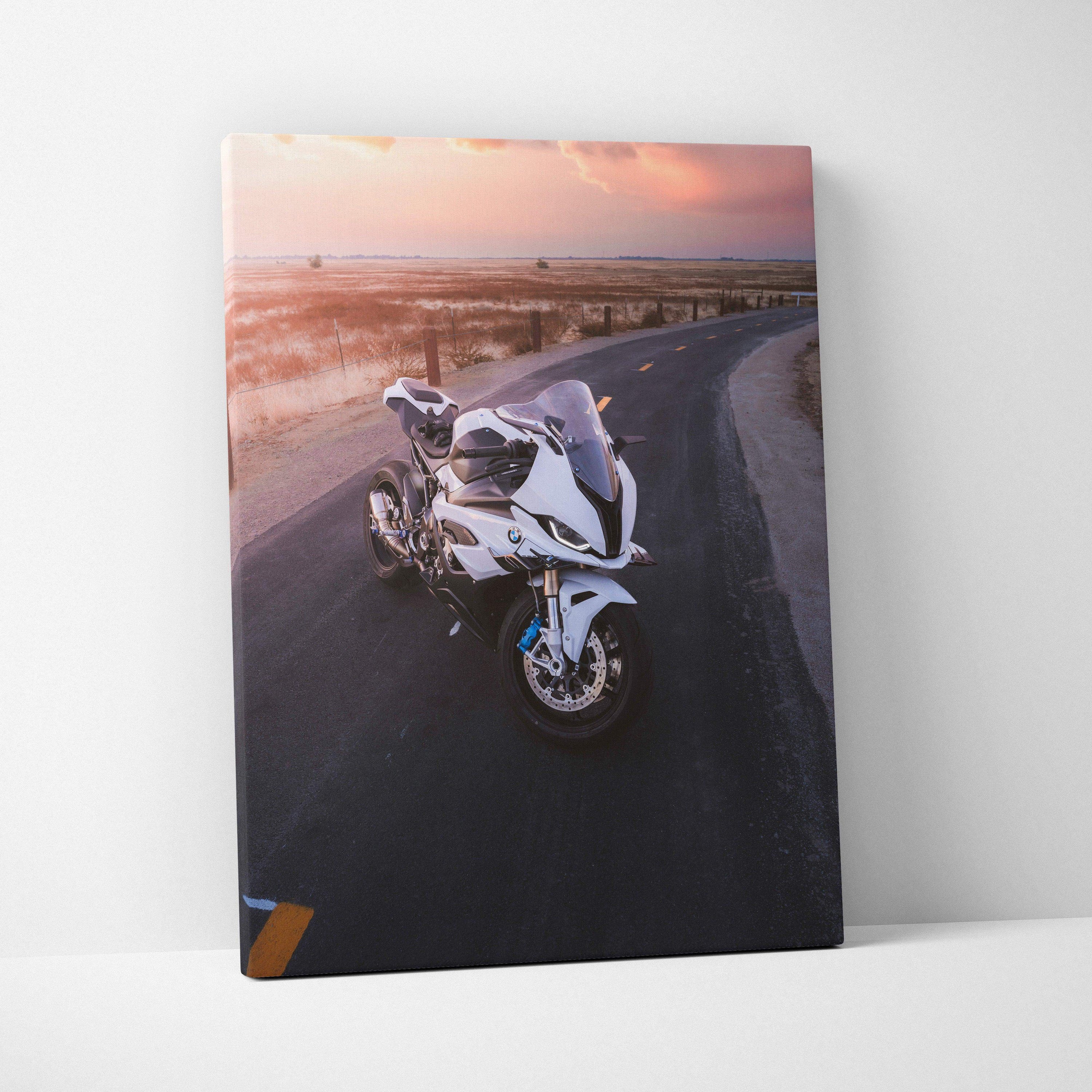 BMW S1000RR motorcycle on curved road at sunset canvas wall art print.