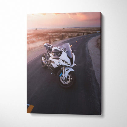BMW S1000RR motorcycle on winding road at sunset canvas wall art print.